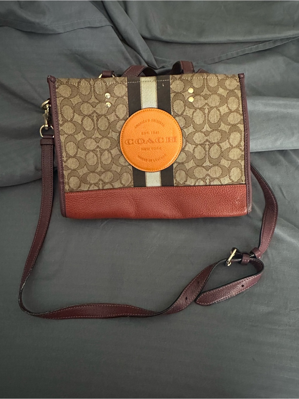 Coach Signature Canvas Messenger Bag with Burgundy Trim and Orange Patch